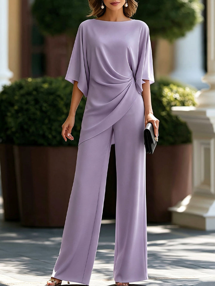 Modny outfit damski: elegancka bluzka i spodnie na specjalne okazje