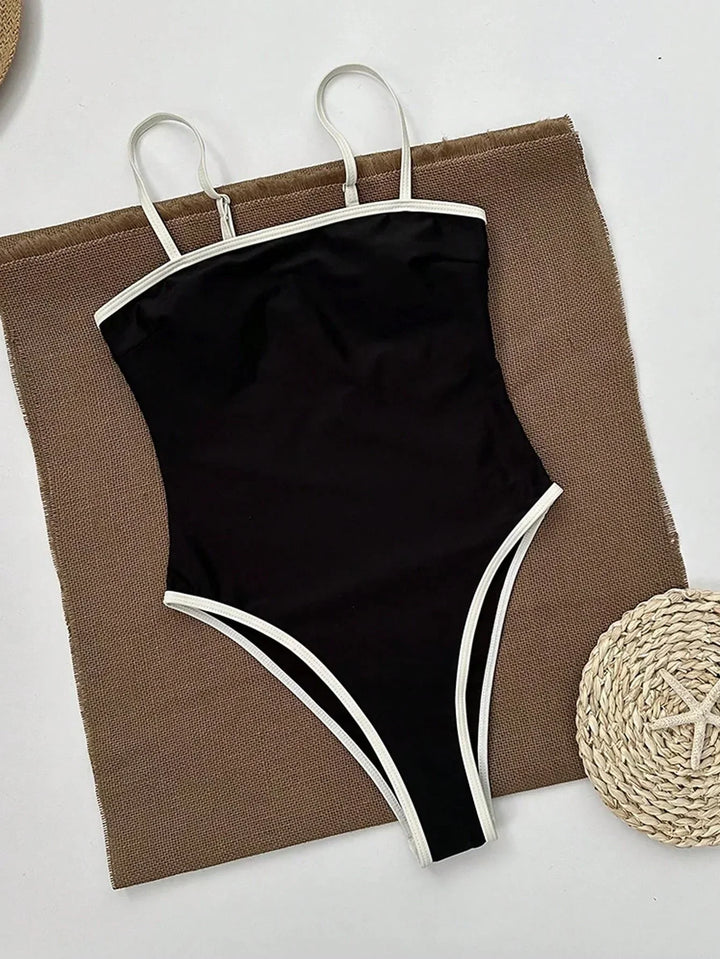 Minimalistyczny damski kostium kąpielowy jednoczęściowy na plażę