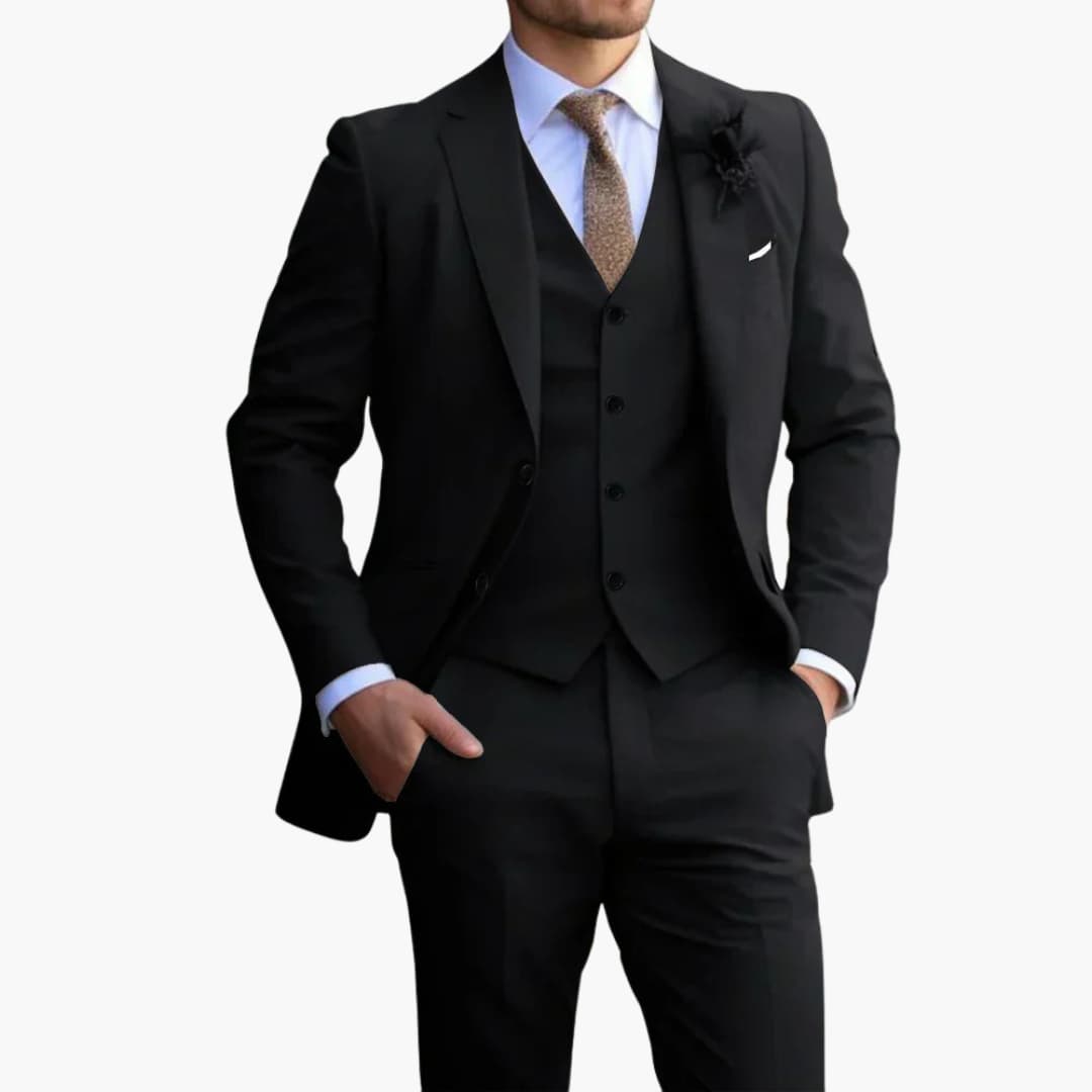 Mężczyzna w klasycznym czarnym garniturze wizytowym z kamizelką i elegancką koszulą