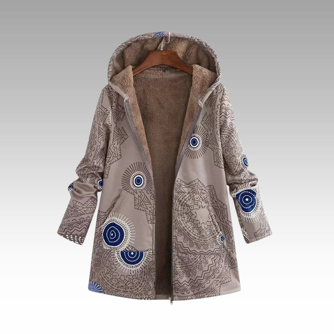 Khaki damska kurtka zimowa w stylu boho prezentowana na wieszaku