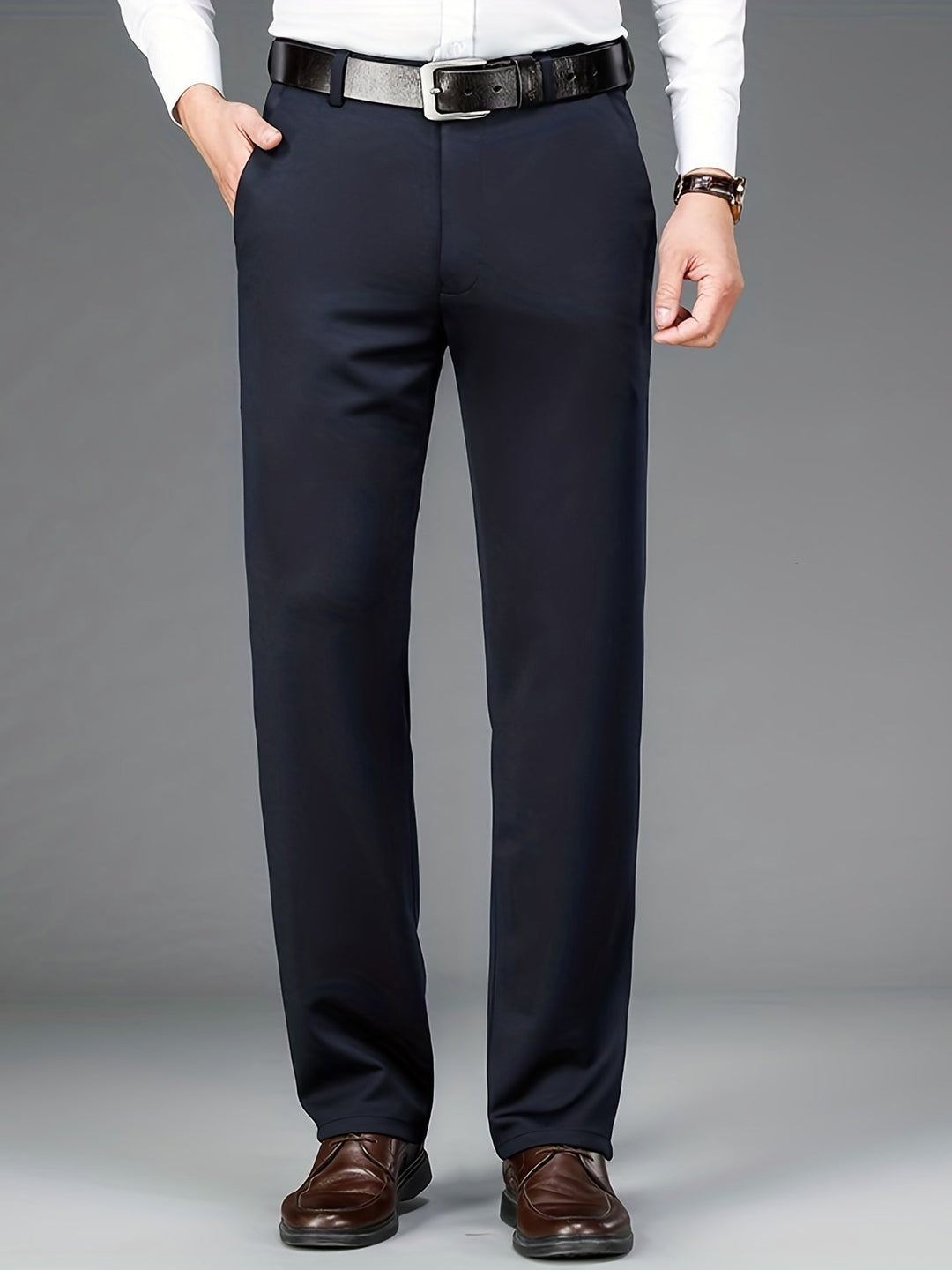 Męskie eleganckie spodnie regular fit w kolorze granatowym z prostą nogawką