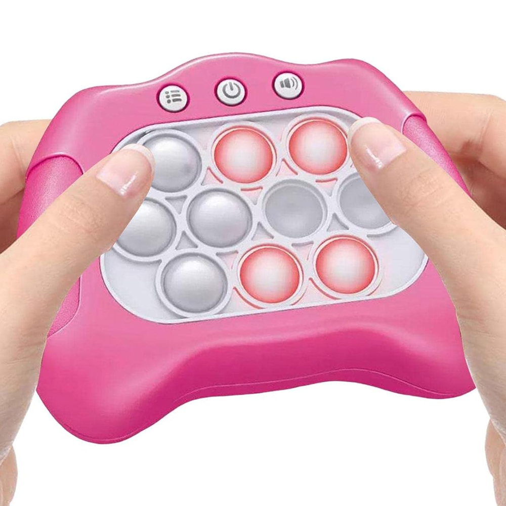 Różowa świecąca konsola fidget pop trzymana w dłoniach