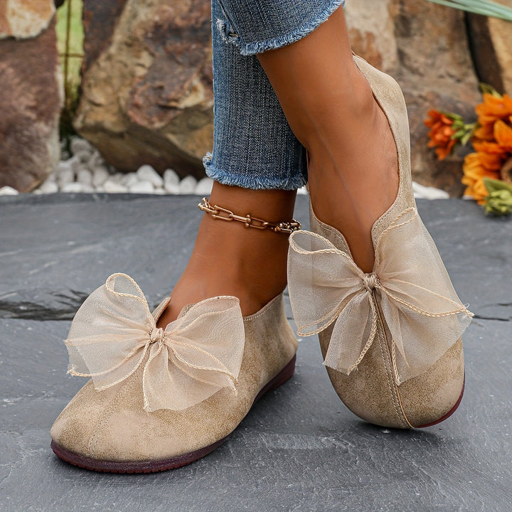 Damskie buty płaskie slip-on z ozdobną kokardą, tył