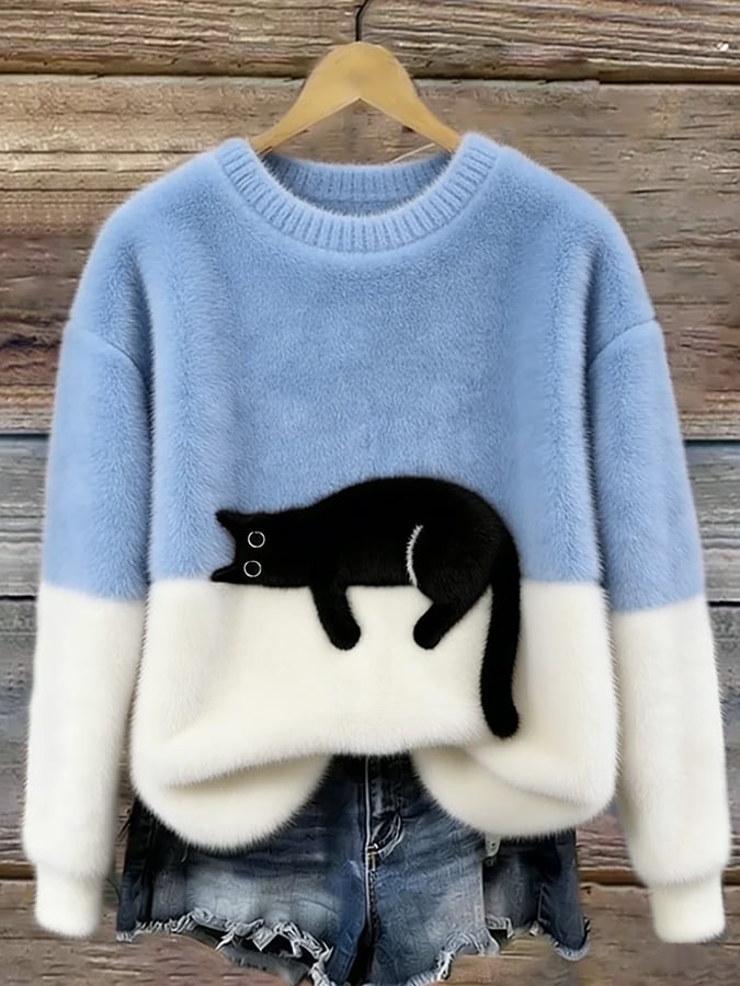 Jasnoniebieski damski sweter oversize z motywem śpiącego kota