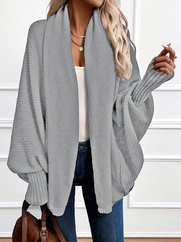 Elegancki sweter damski Odessa, widok z boku w luźnym kroju