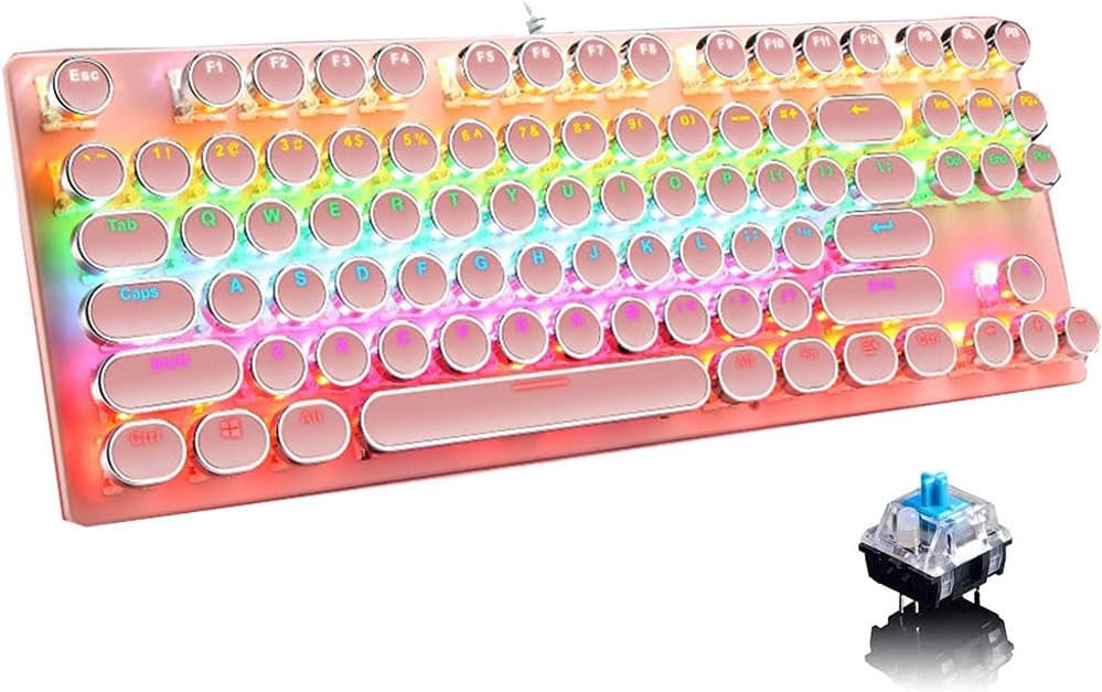 Różowa mechaniczna klawiatura gamingowa RGB z okrągłymi klawiszami i widocznym niebieskim przełącznikiem obok