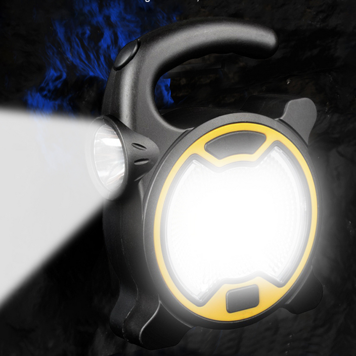 Żółta lampa robocza COB LED emitująca jasny strumień światła w ciemności