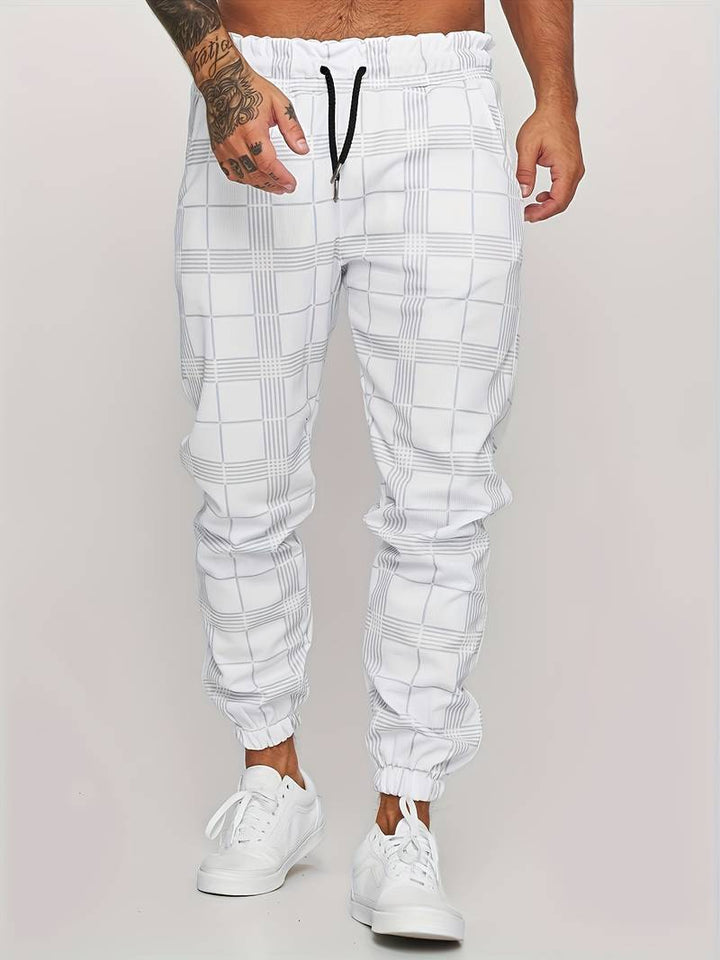 Męskie spodnie joggery slim fit w kratę zestawione z modną bluzą