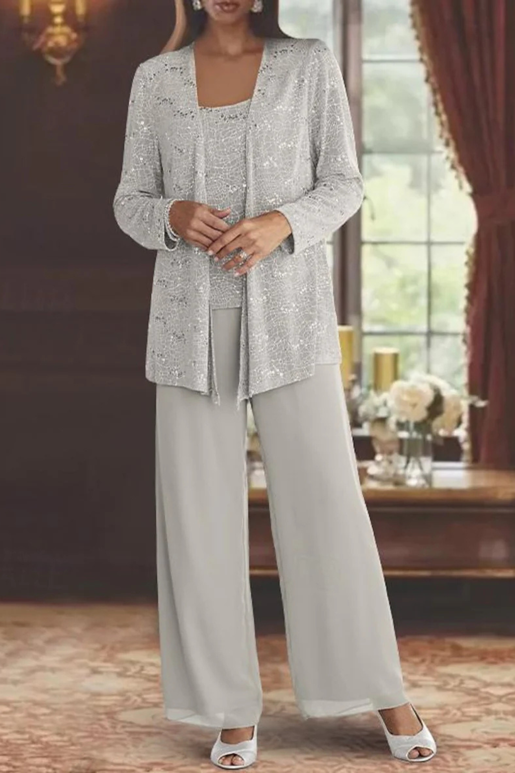 Zbliżenie na elegancki damski żakiet i top z cekinami