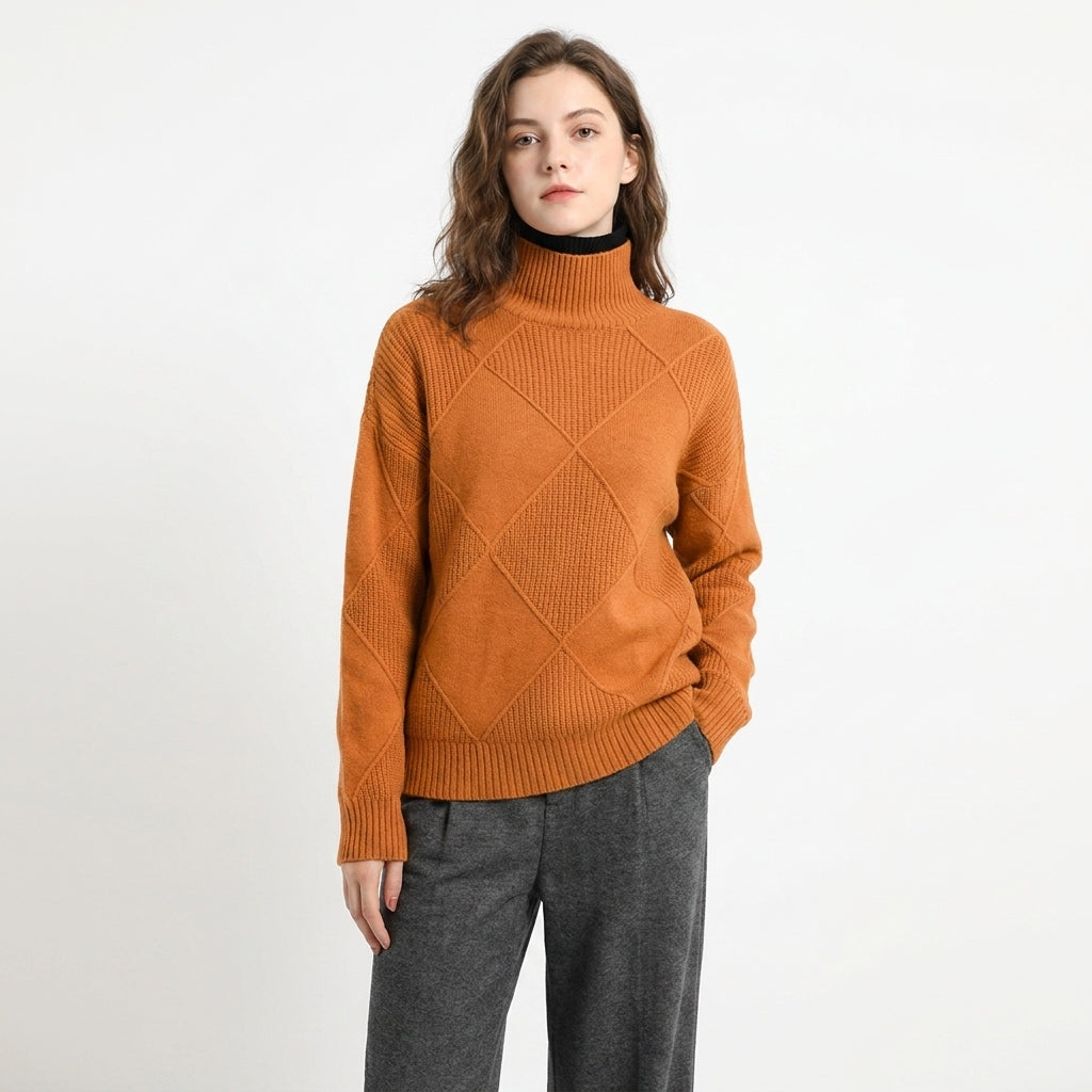 Elegancki pomarańczowy sweter z golfem prezentowany przez modelkę