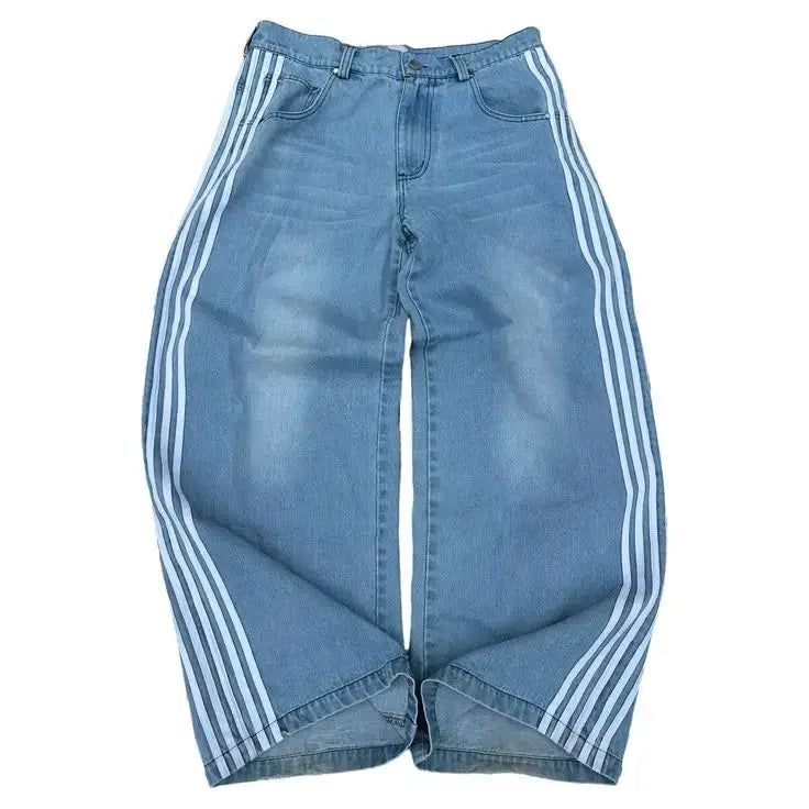 Niebieskie damskie jeansy baggy z wysokim stanem i białymi paskami z przodu