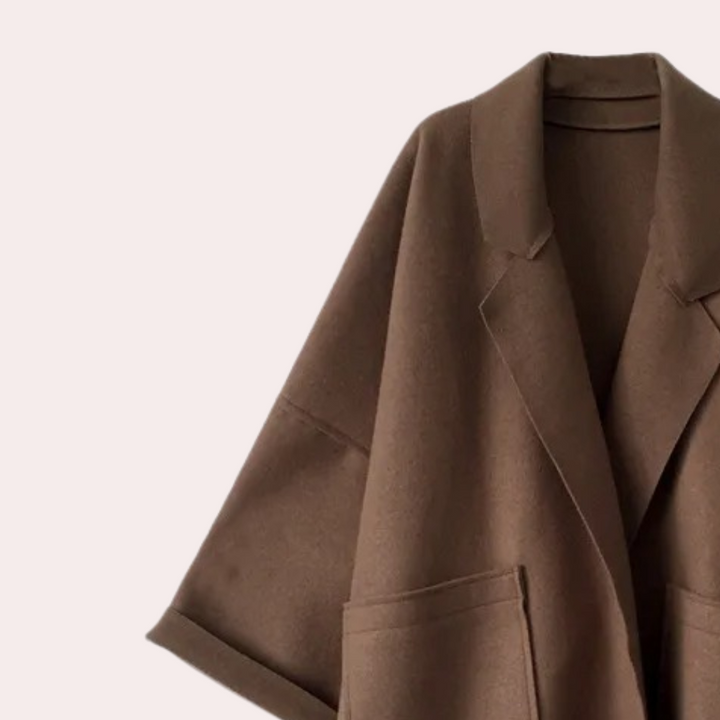 Długi brązowy płaszcz damski oversize przejściowy o eleganckim kroju