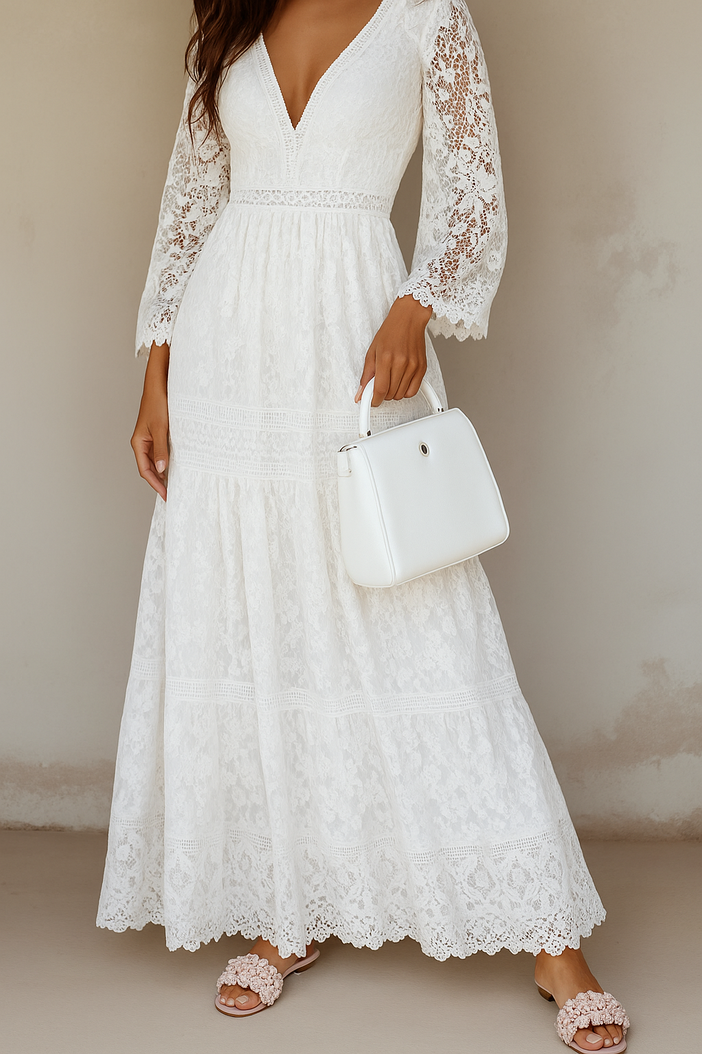 Kobieta prezentująca dłuższą, zwiewną białą sukienkę maxi w stylu boho