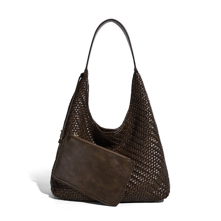 Elegancka torebka damska typu shopper z plecioną strukturą, zbliżenie na materiał