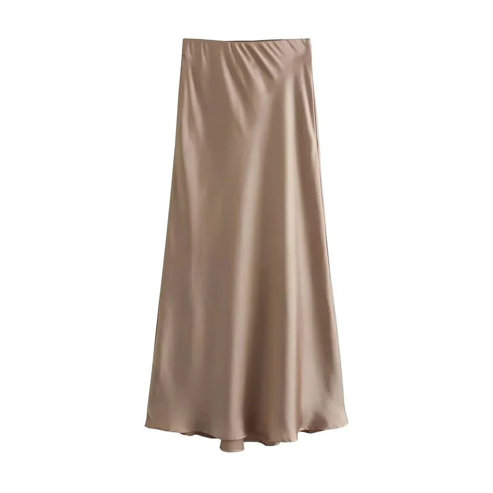 Moda damska - elegancka spódnica midi w pełnym zestawieniu stylizacji
