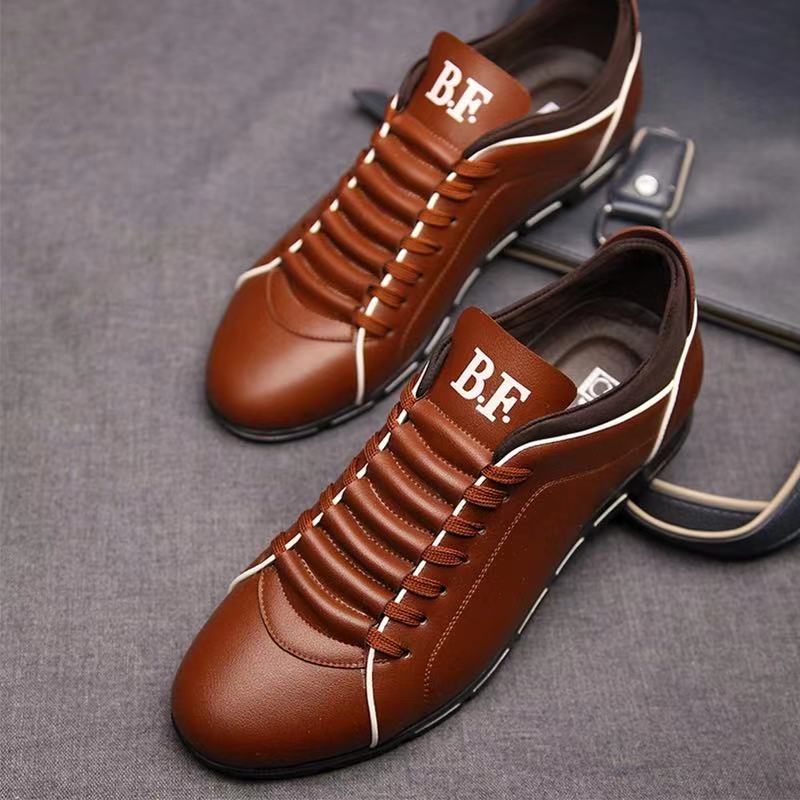 Modne męskie buty casual w odcieniu brązu z wyraźnym sznurowaniem