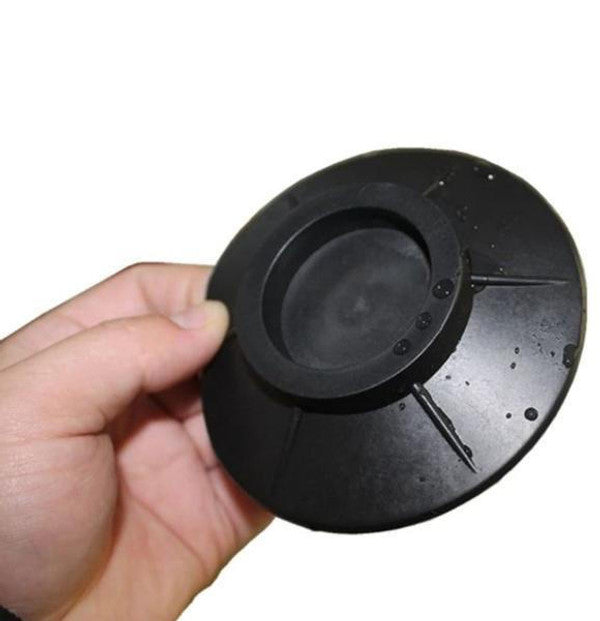 Akcesoria domowe - czarne podkładki antywibracyjne do AGD w zbliżeniu