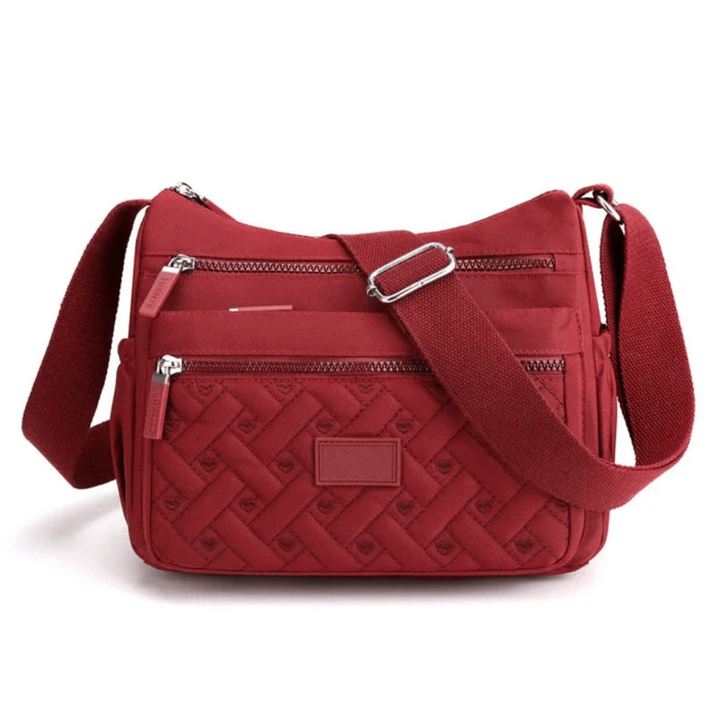 Detale wykończenia eleganckiej torebki damskiej crossbody