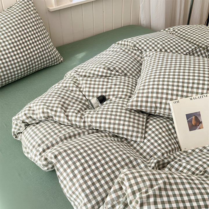 Stylizacja łóżka z pościelą bawełnianą w modną kratkę gingham