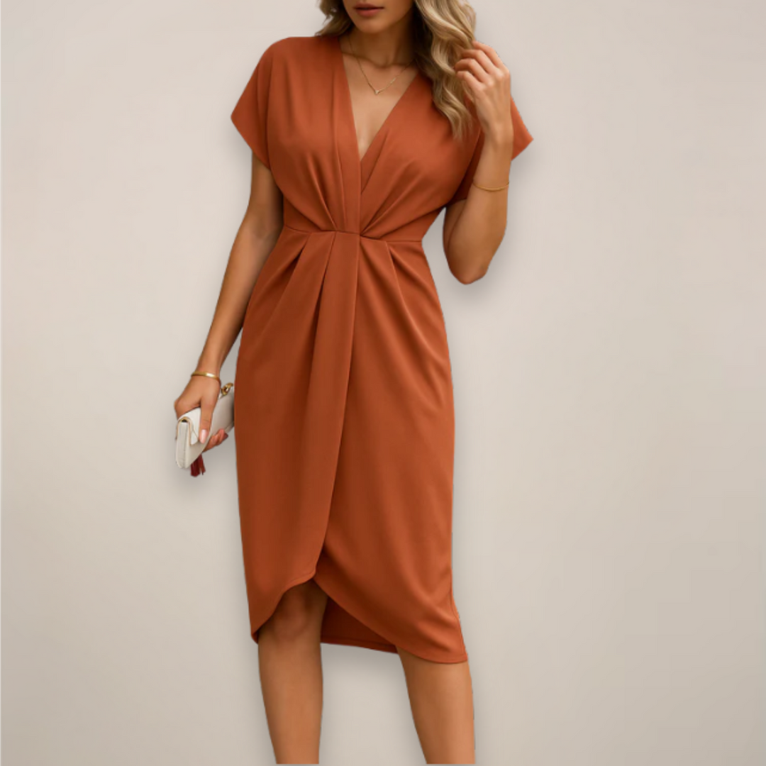 Kobieta w pomarańczowej eleganckiej sukience midi Seraphina