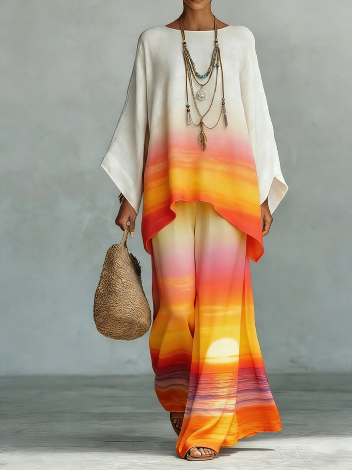 Stylowy komplet na wakacje, biała tunika boho ze spodniami, zbliżenie na wzór