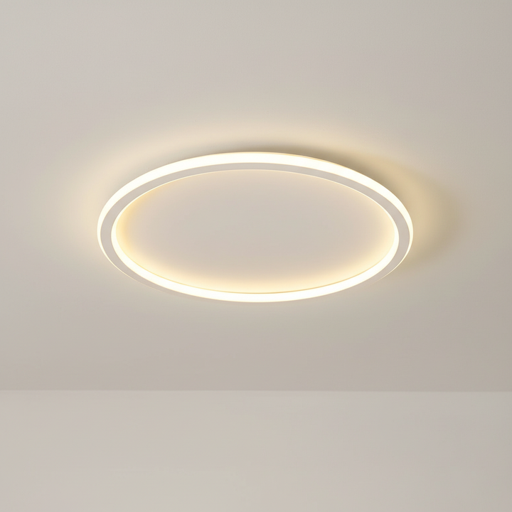 Okrągła lampa sufitowa zamontowana w nowoczesnej kuchni