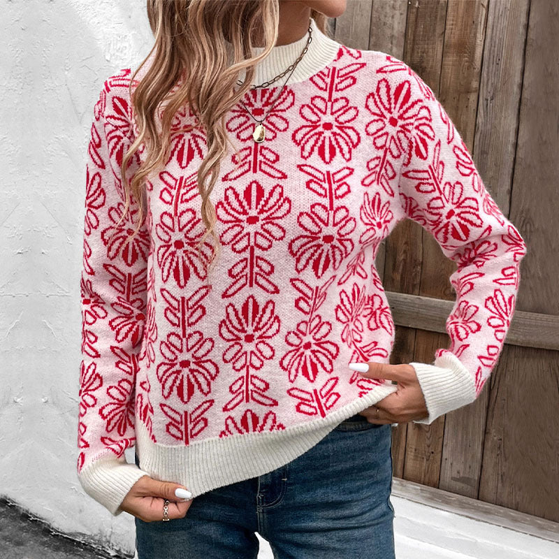 Zbliżenie na elegancki czerwony sweter damski z motywem kwiatowym