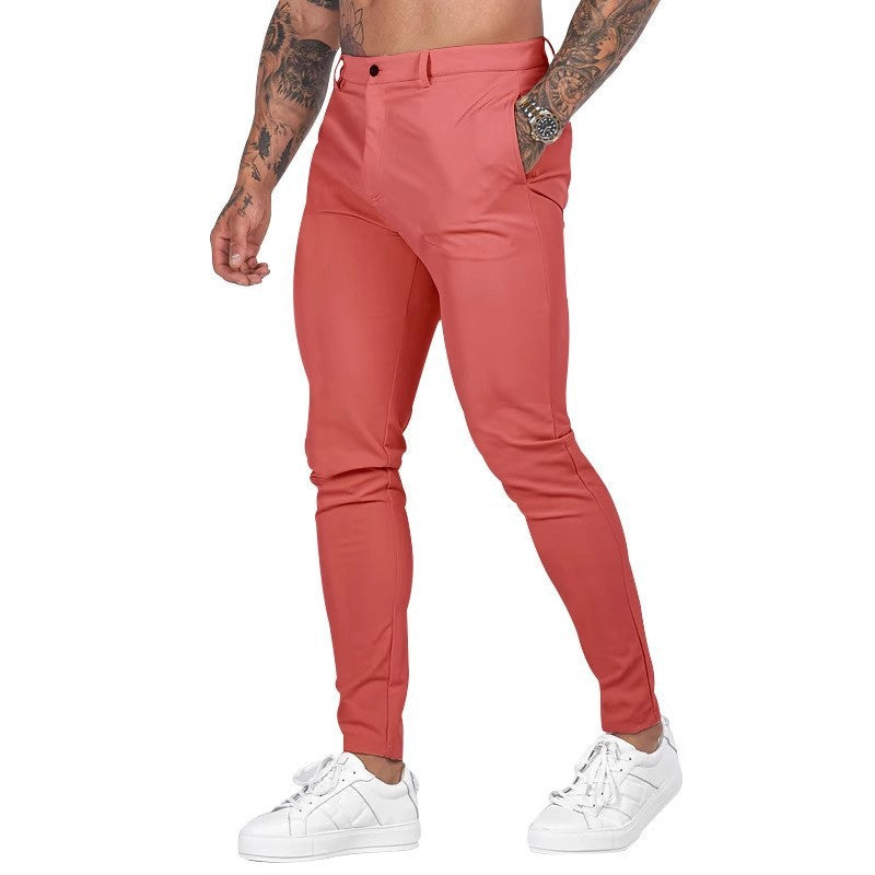 Męskie chinosy slim fit w kolorze różowym z dopasowanymi nogawkami