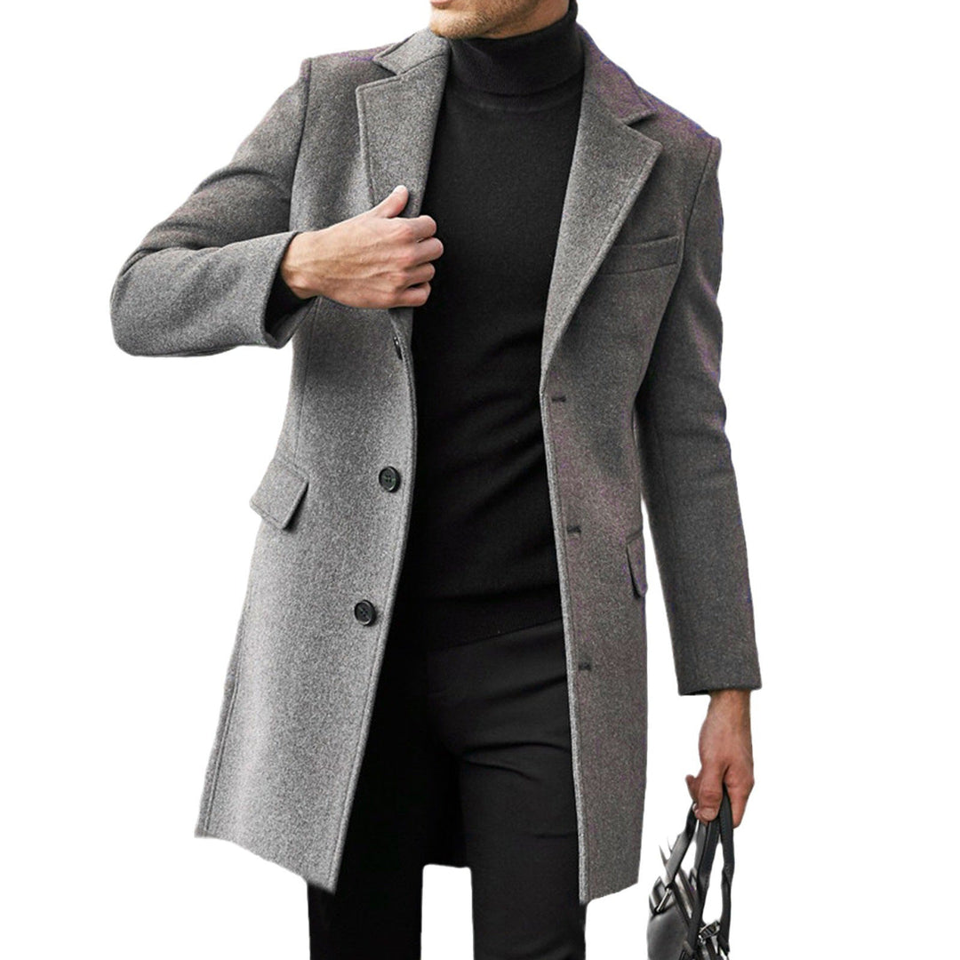 Szary męski płaszcz zimowy o kroju slim fit z modnymi klapami