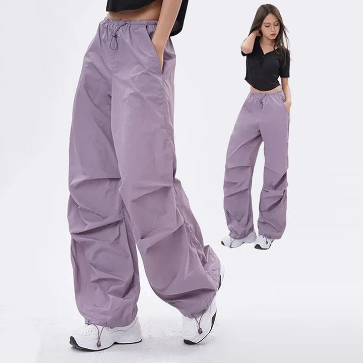 Fioletowe luźne spodnie cargo damskie w stylu streetwear z pojemnymi kieszeniami