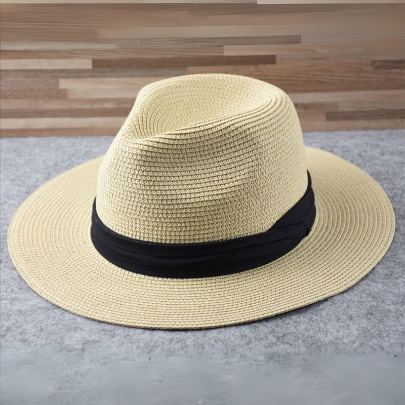 Stylowy kapelusz pleciony panama prezentowany na neutralnym tle