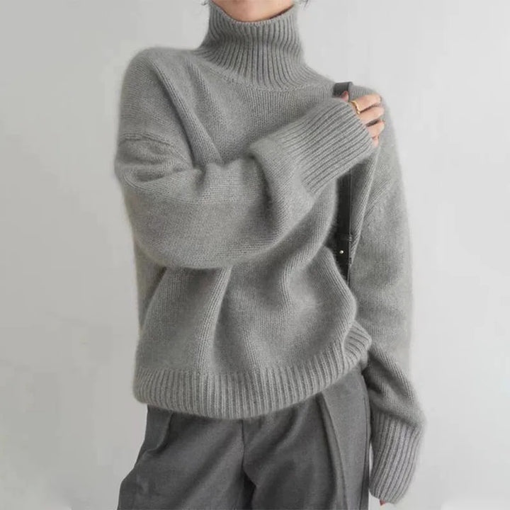 Modny zimowy sweter oversize z wysokim golfem