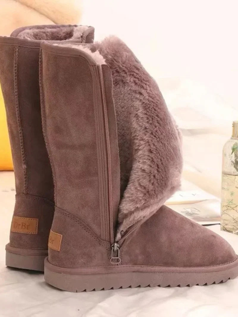 Modne brązowe botki zimowe damskie, stylowe i komfortowe buty do kolan