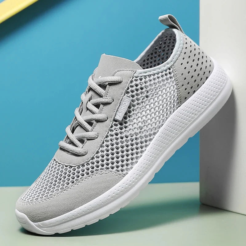 Szare męskie buty sportowe z siateczki na białej podeszwie