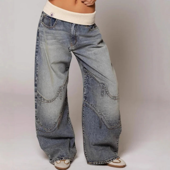 Niebieskie spodnie denim damskie o luźnym kroju baggy i szerokimi nogawkami
