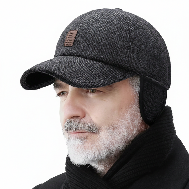 Profil męskiej czapki zimowej retro z widocznym nausznikiem i daszkiem