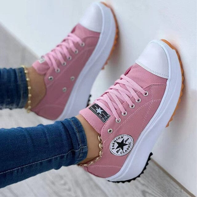 Różowe damskie sneakersy na platformie w stylizacji miejskiej