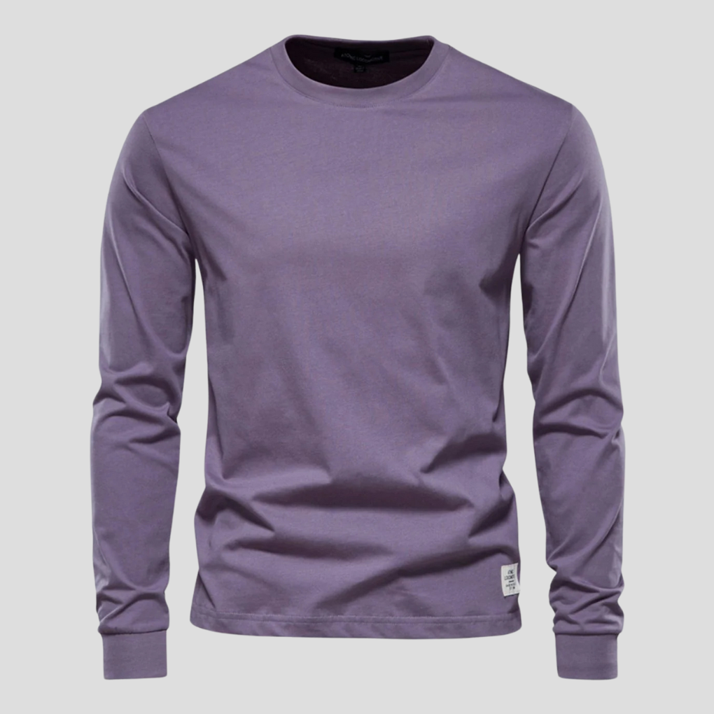 Bawełniany longsleeve męski w kolorze klasycznej bieli na manekinie