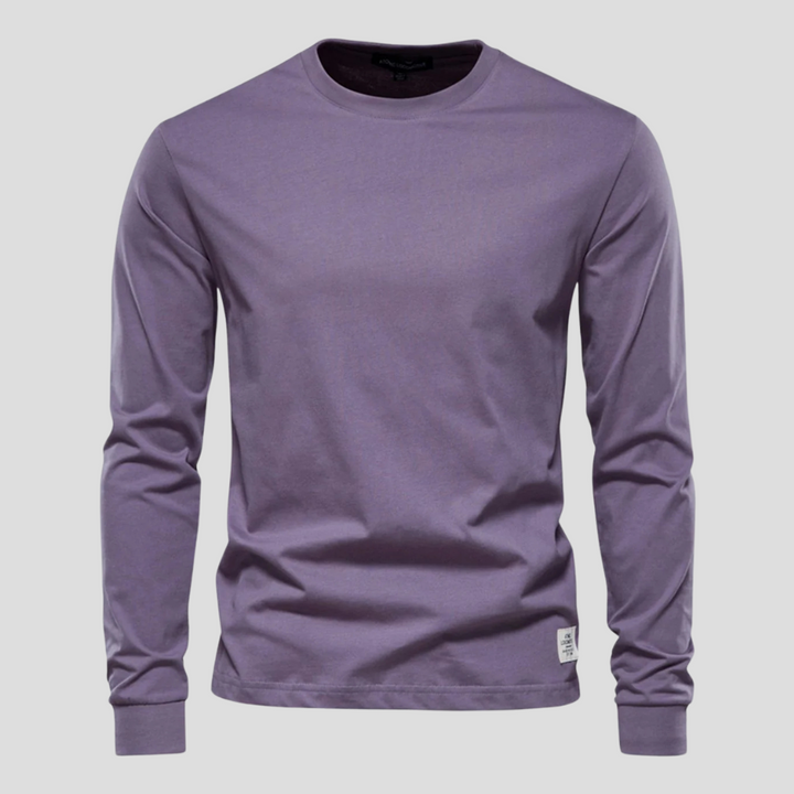 Bawełniany longsleeve męski w kolorze klasycznej bieli na manekinie