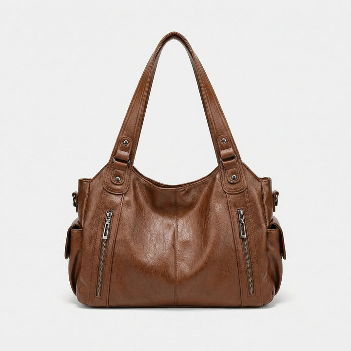 Uniwersalna damska torba crossbody pokazana od spodu i boku