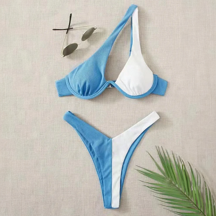 Dwuczęściowy strój kąpielowy bikini asymetryczny dla kobiet. Stylowy, dwukolorowy design, idealny na plażę.