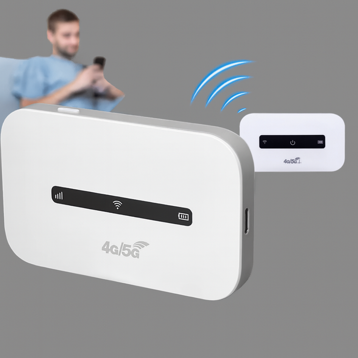 Mężczyzna korzystający ze smartfona w pobliżu przenośnego routera Wi-Fi