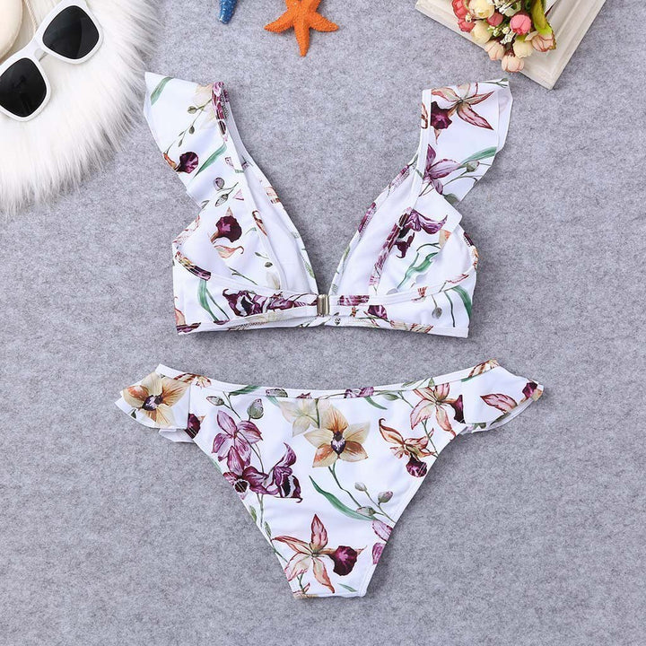 Dwuczęściowy kostium kąpielowy bikini dla kobiet z falbankami i kwiatowym wzorem. Na lato.