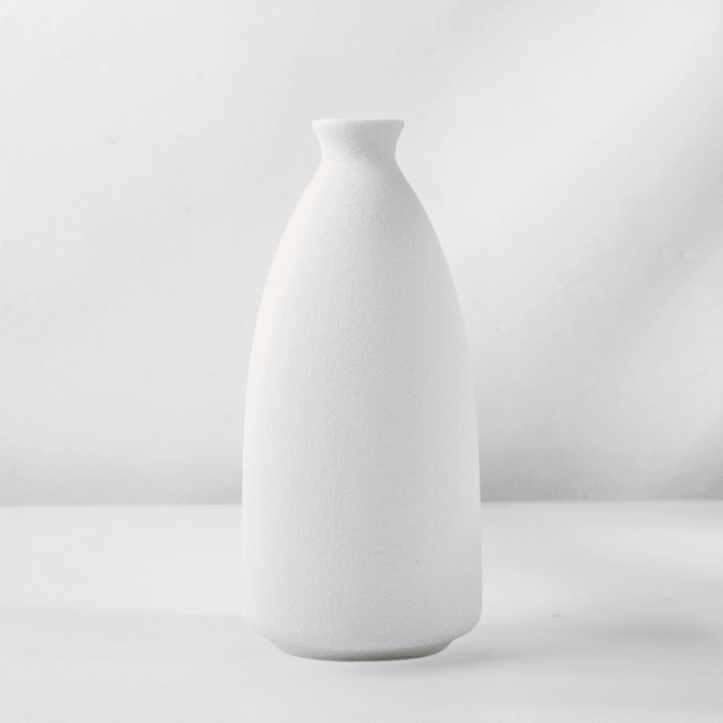 Uniwersalny biały wazon ceramiczny w stylu nordyckim, minimalistyczna ozdoba do każdego wnętrza domu.