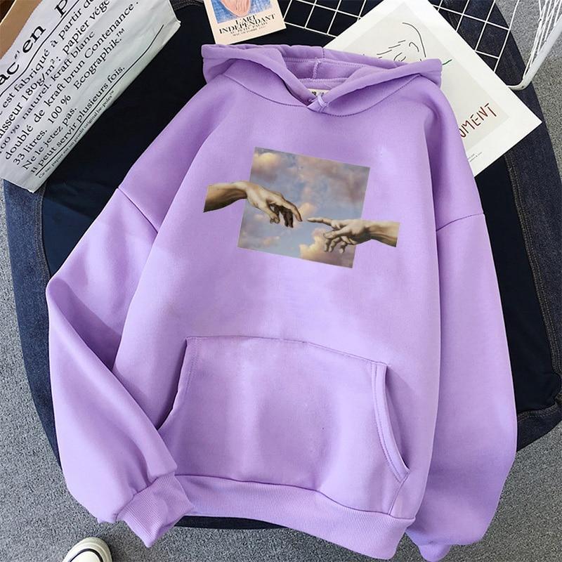 Bluza damska nierozpinana z kapturem, artystyczny nadruk dłoni. Dostępna w rozmiarach plus size, komfortowa.