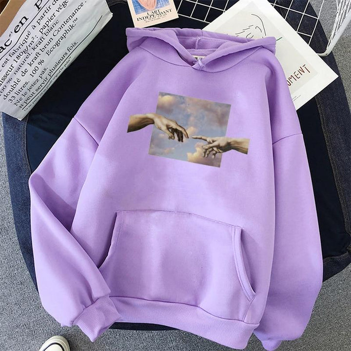 Bluza damska nierozpinana z kapturem, artystyczny nadruk dłoni. Dostępna w rozmiarach plus size, komfortowa.