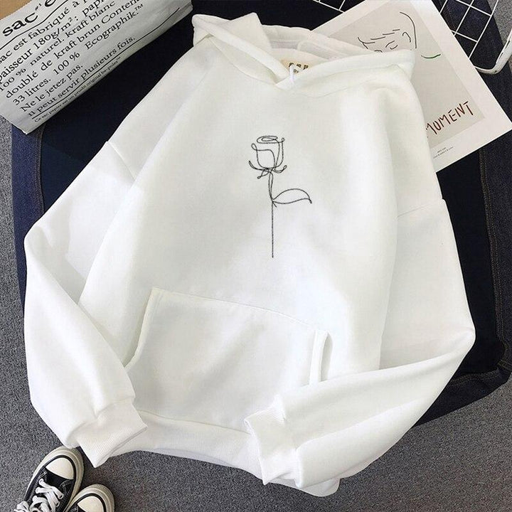 Elegancka bluza damska z kapturem i detalem róży. Modna odzież casualowa, wykonana z komfortowej dzianiny.