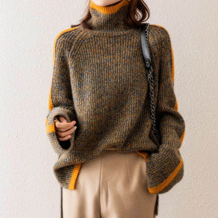 Stylowy, brązowy sweter damski oversize. Niezbędny element garderoby na jesień i zimę, zapewnia ciepło.