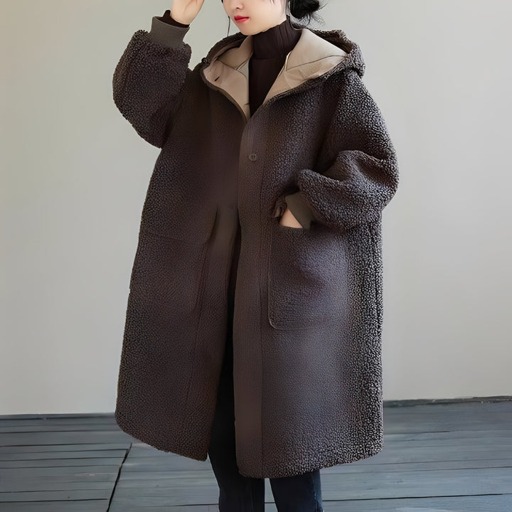 Ciepły damski płaszcz oversize z kapturem, idealny na zimę, modny casualowy styl.