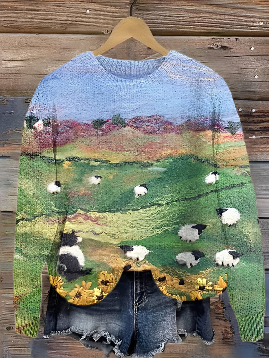 Zimowy sweter damski z dzianiny z uroczym nadrukiem owcy. Stylowy i komfortowy na chłodne dni.